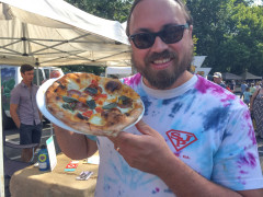 chef with chef special pizza